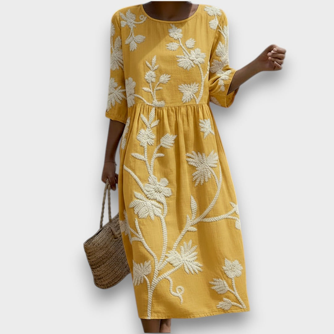 Yassy | Midi-jurk met planten- en bloemenprint
