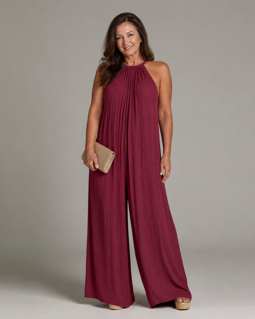 Sylvara | Geplooide halter jumpsuit met wijde pijpen