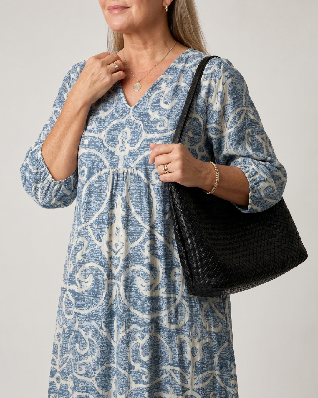 Lumera | Soepel vallende midi-jurk met vintage print