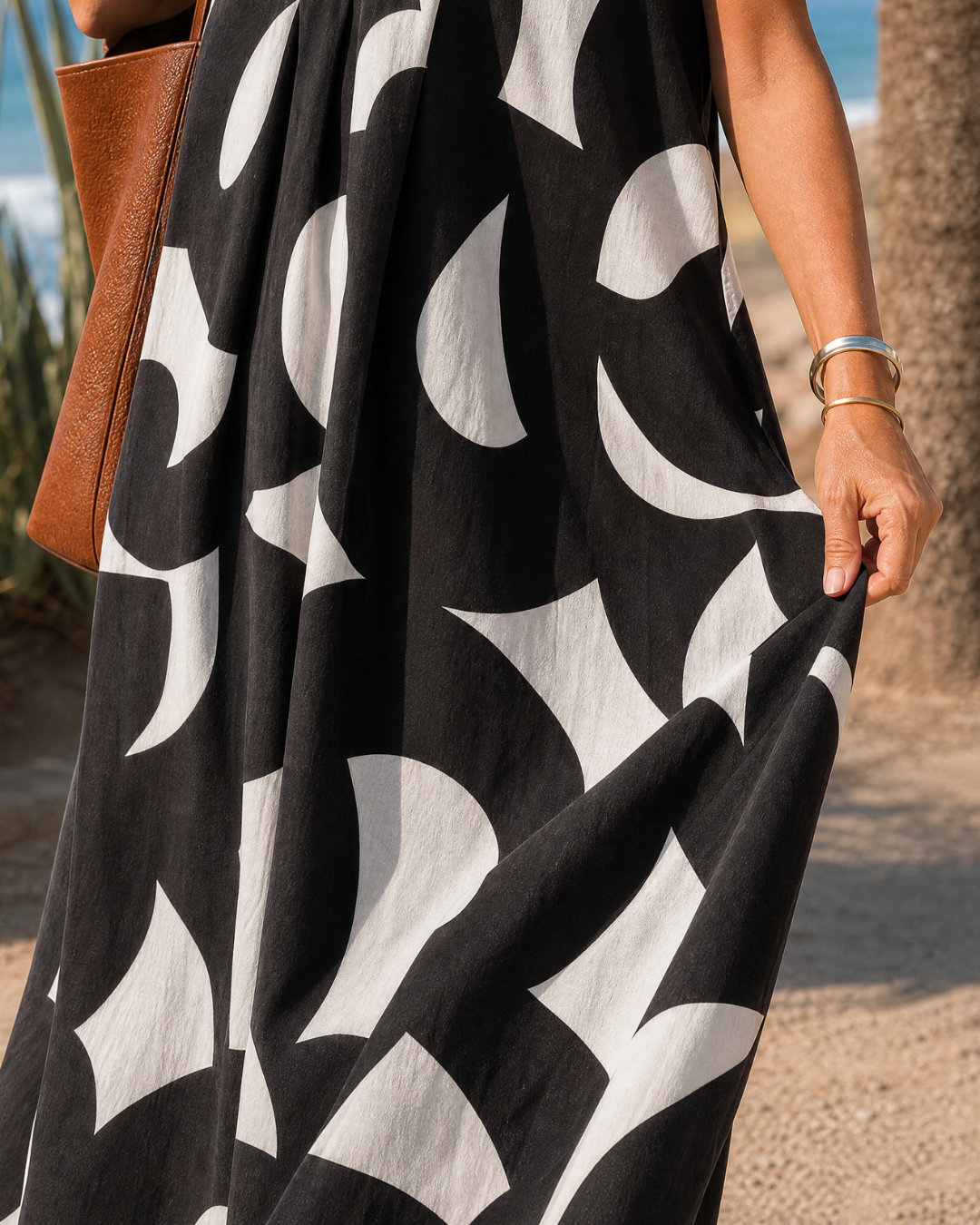 Verain | Midi-jurk met print en V-hals