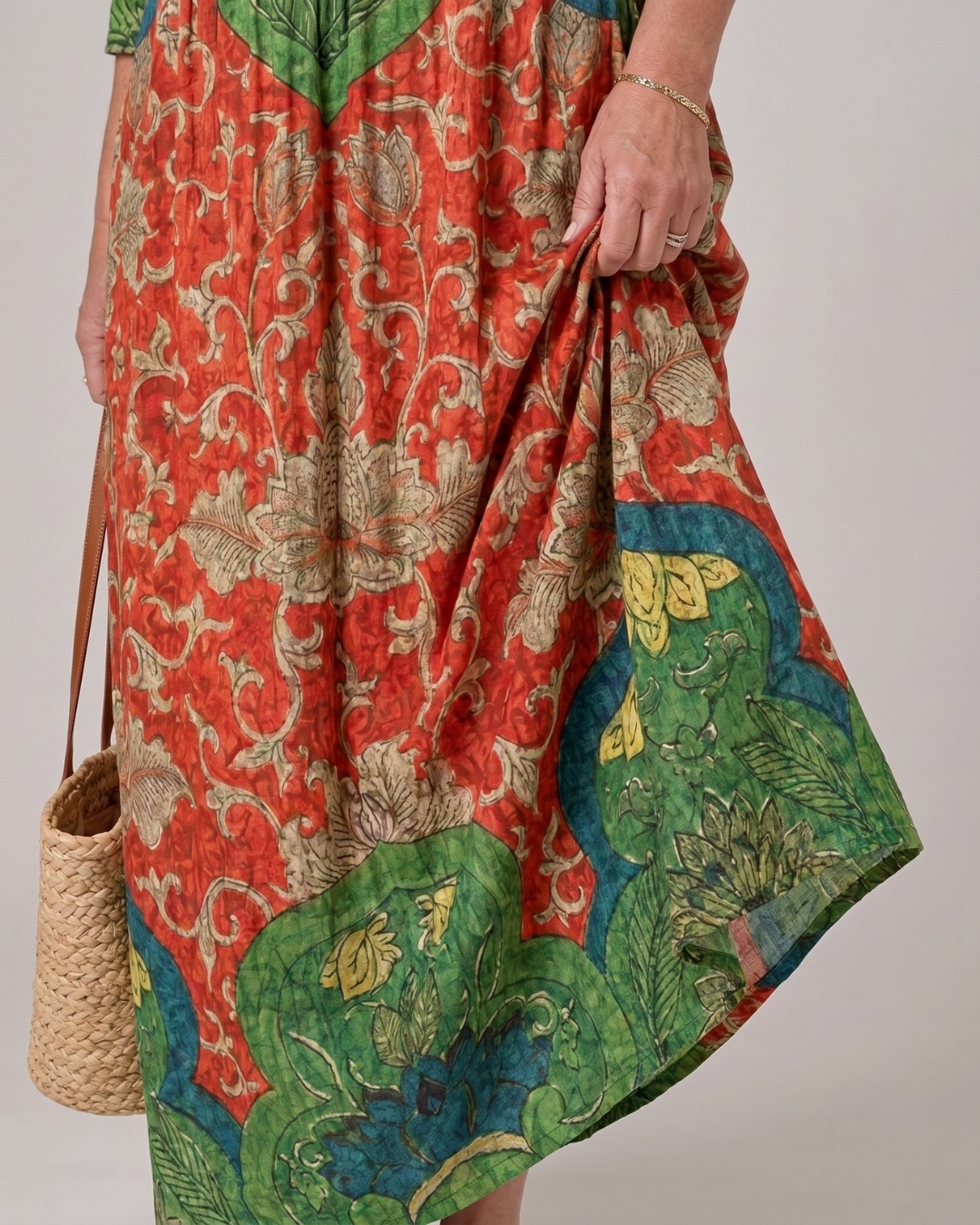 Zeloria | Soepele midi-jurk met abstracte vintage print en driekwartmouw
