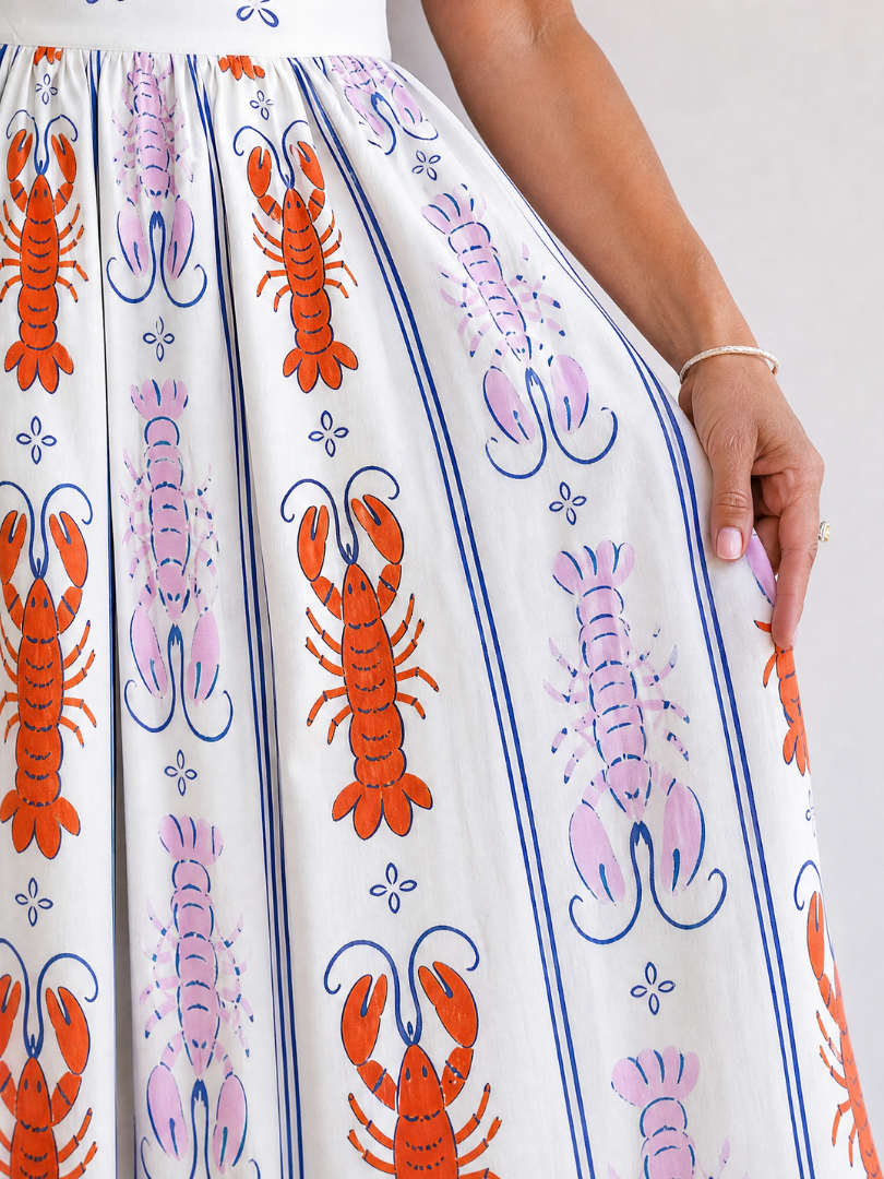 Coralyse | Mouwloze midi-jurk met kreeftprint
