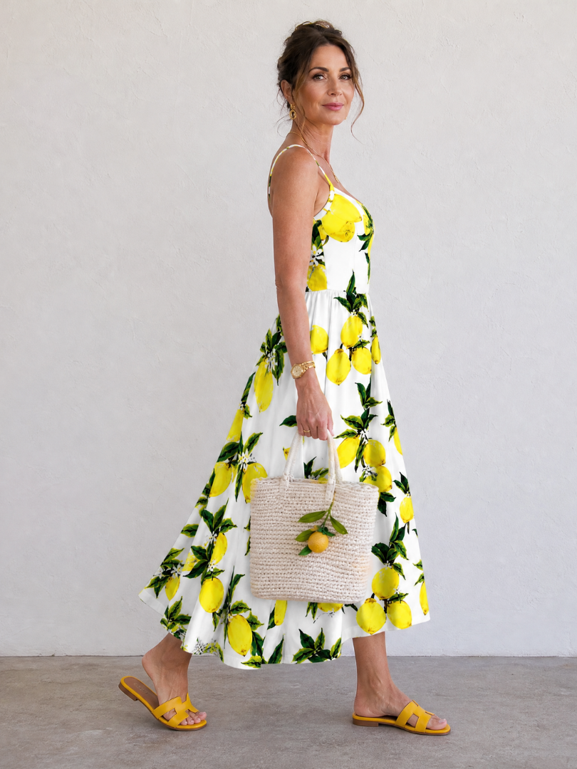 Limonelle | Mouwloze midi-jurk met citroenprint