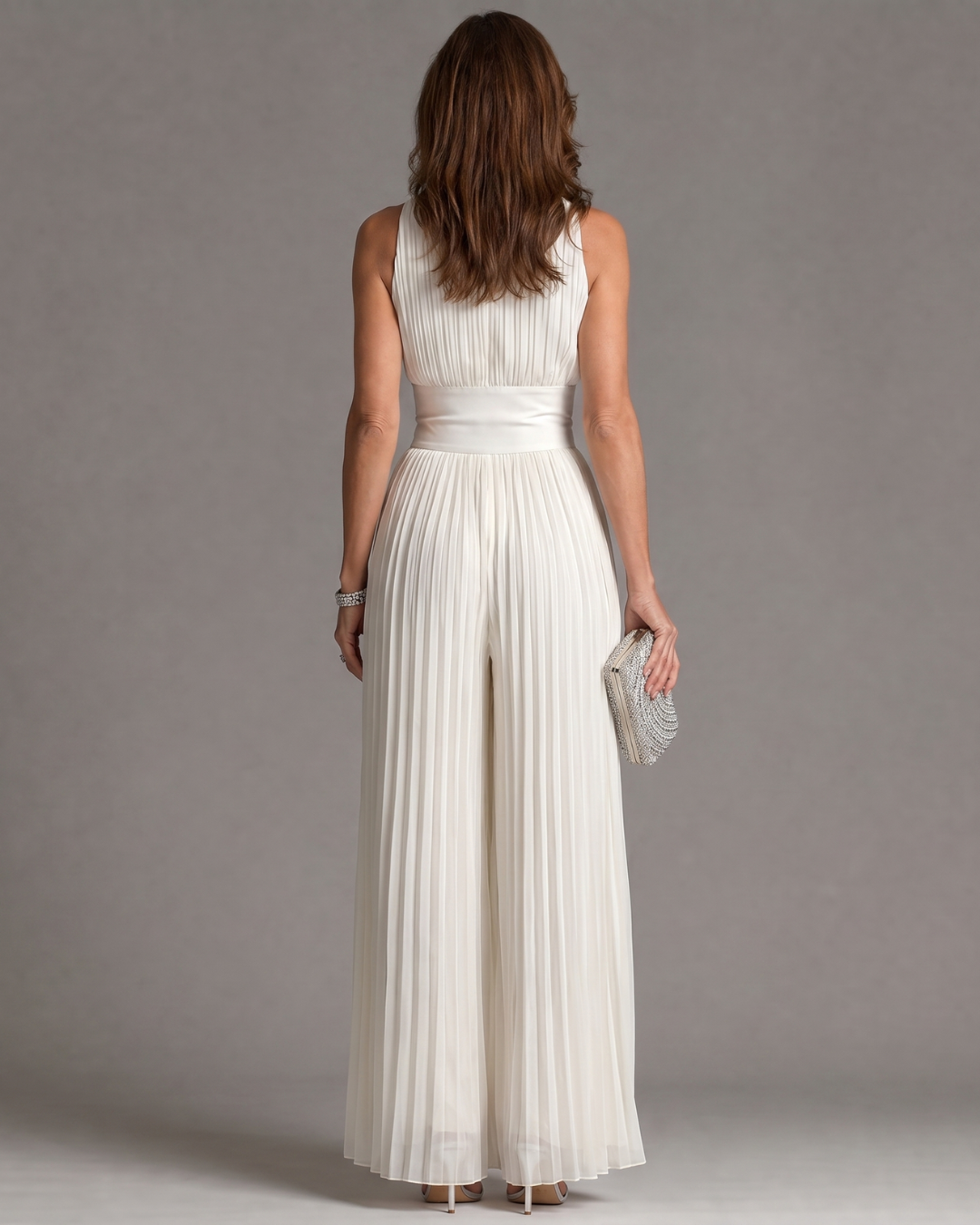Zakira | Geplooide halter jumpsuit met wijde pijpen