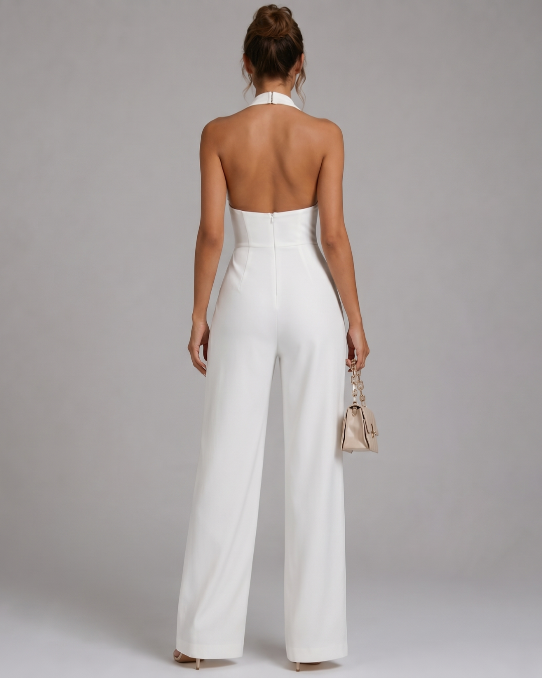 Nymera | Mouwloze halter jumpsuit met wijde pijpen