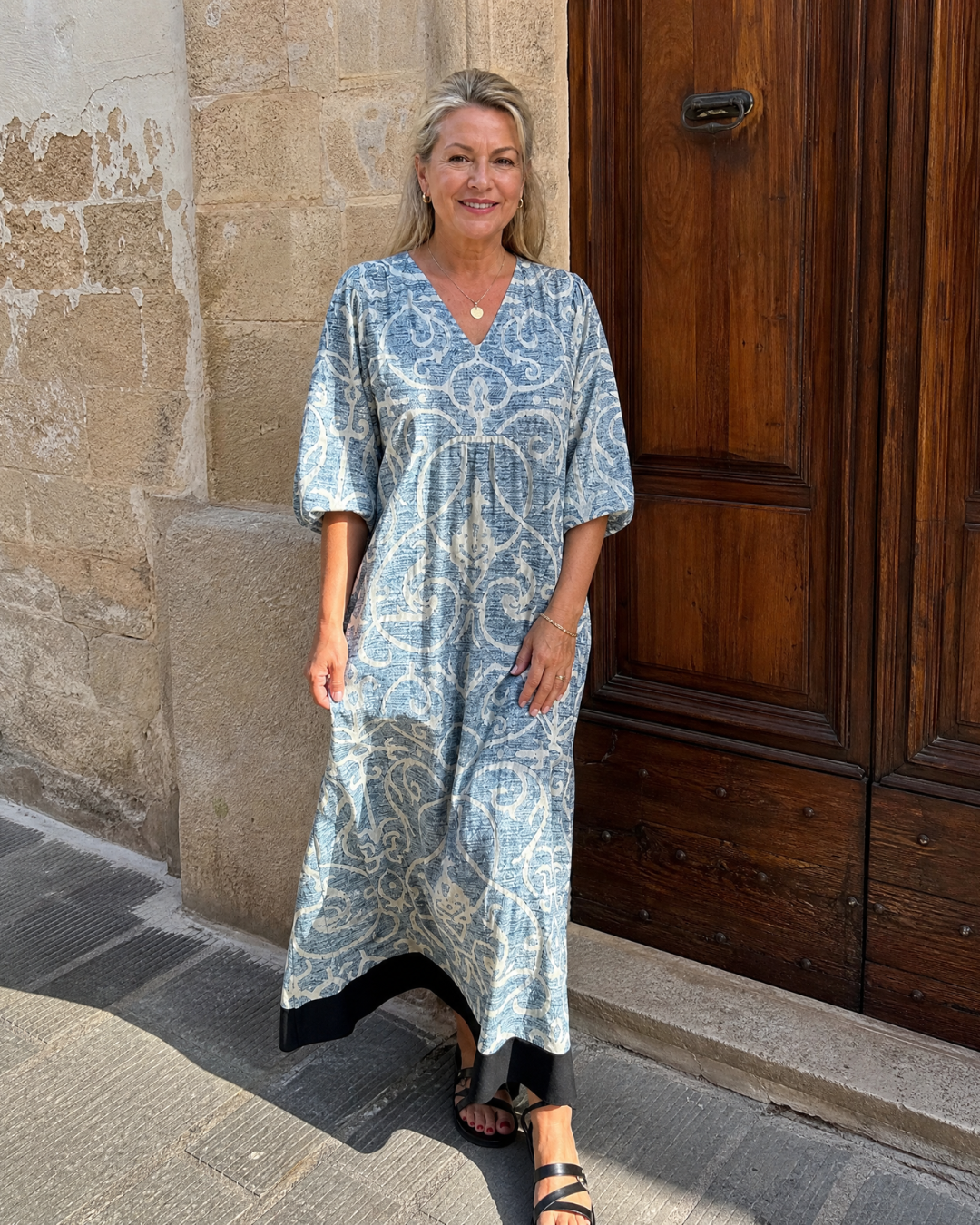 Lumera | Soepel vallende midi-jurk met vintage print