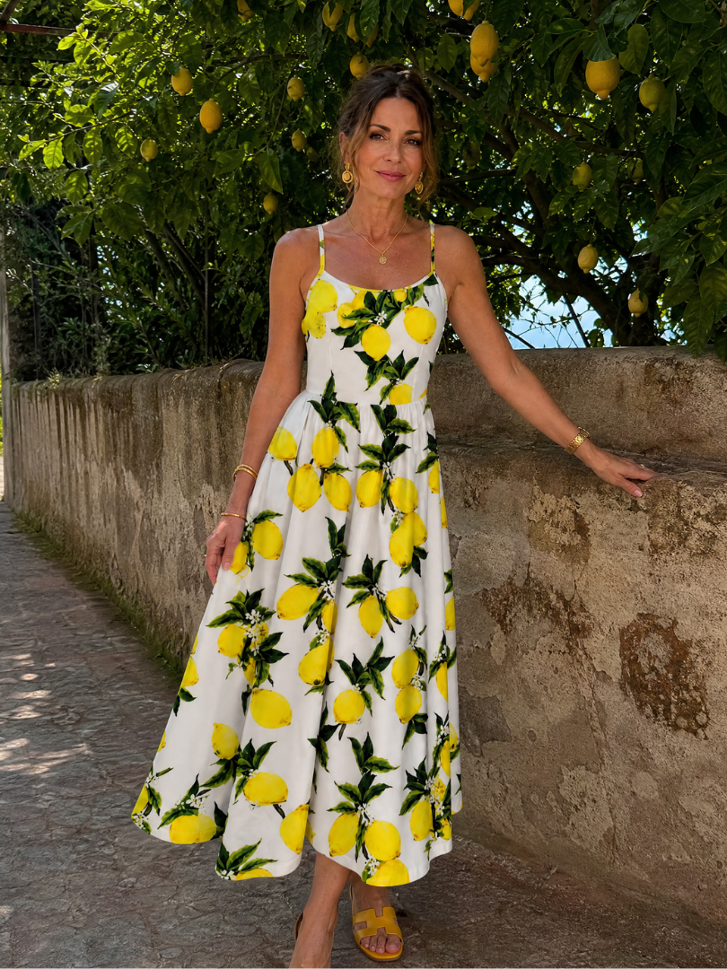 Limonelle | Mouwloze midi-jurk met citroenprint
