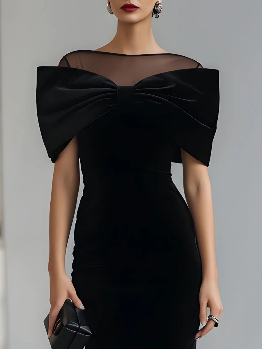 Regina ❘ Dramatische zwarte fluwelen midi-jurk met strik