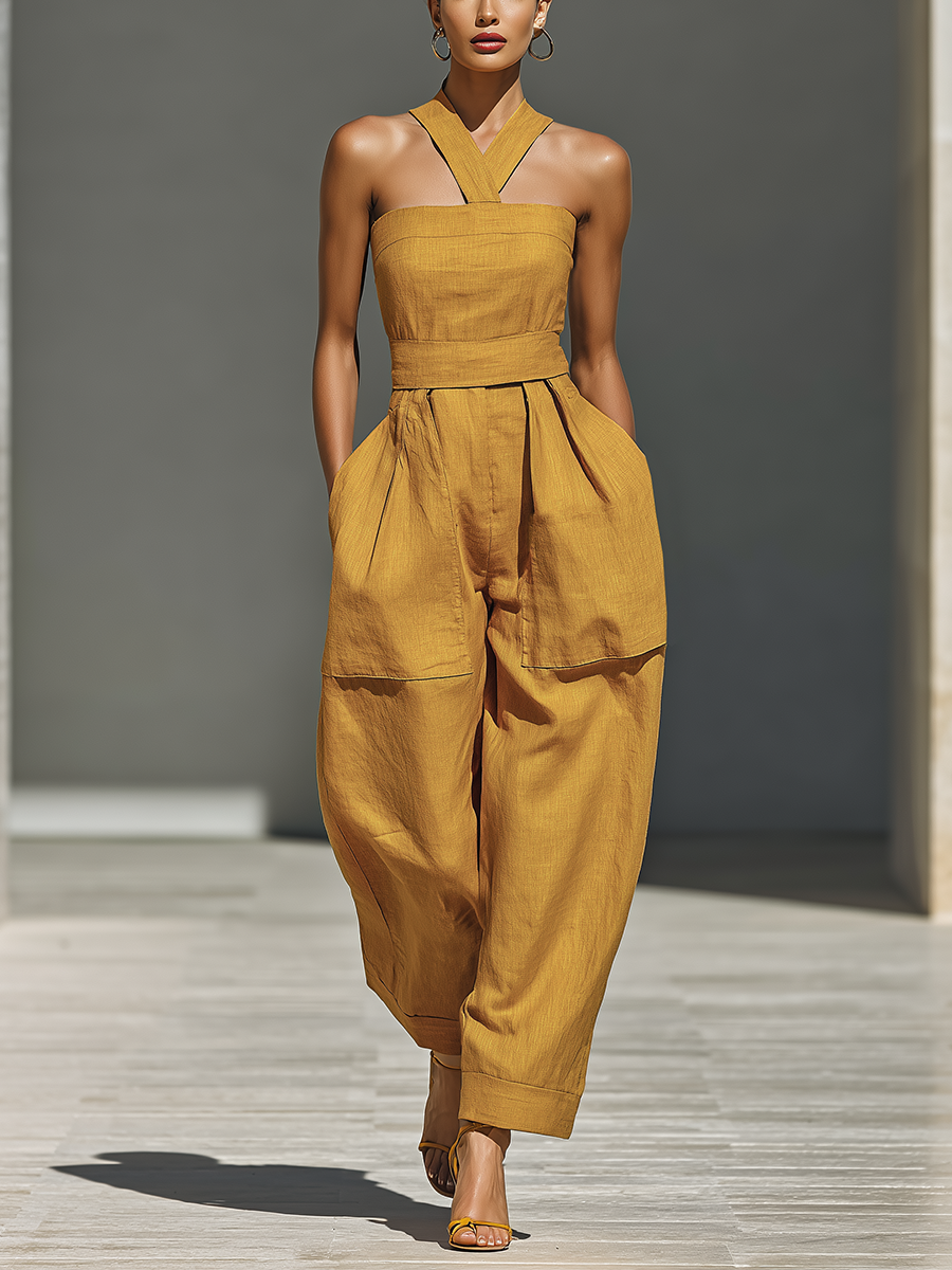 Gabrielle | Mouwloze jumpsuit met gekruiste halslijn en wijde pijpen