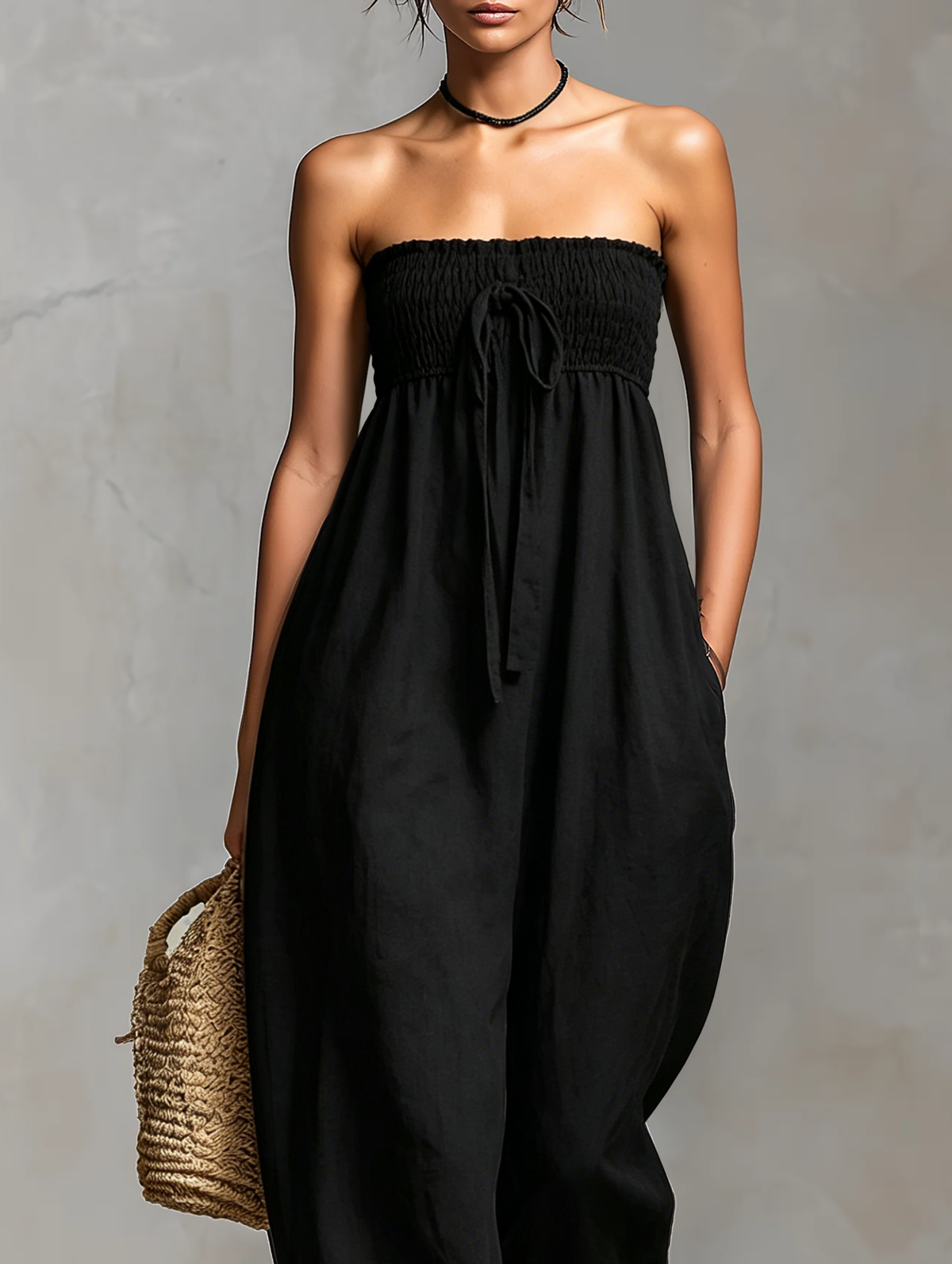 Fleur | Mouwloze jumpsuit met strikceintuur