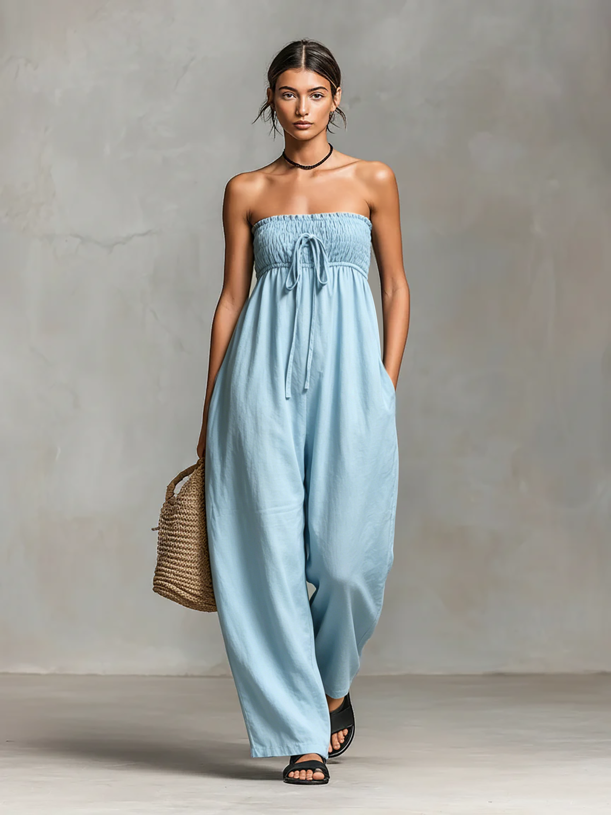Fleur | Mouwloze jumpsuit met strikceintuur