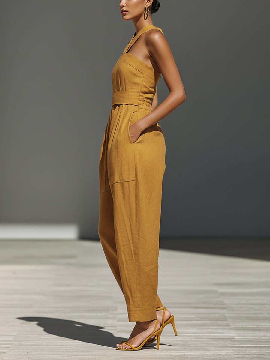 Gabrielle | Mouwloze jumpsuit met gekruiste halslijn en wijde pijpen