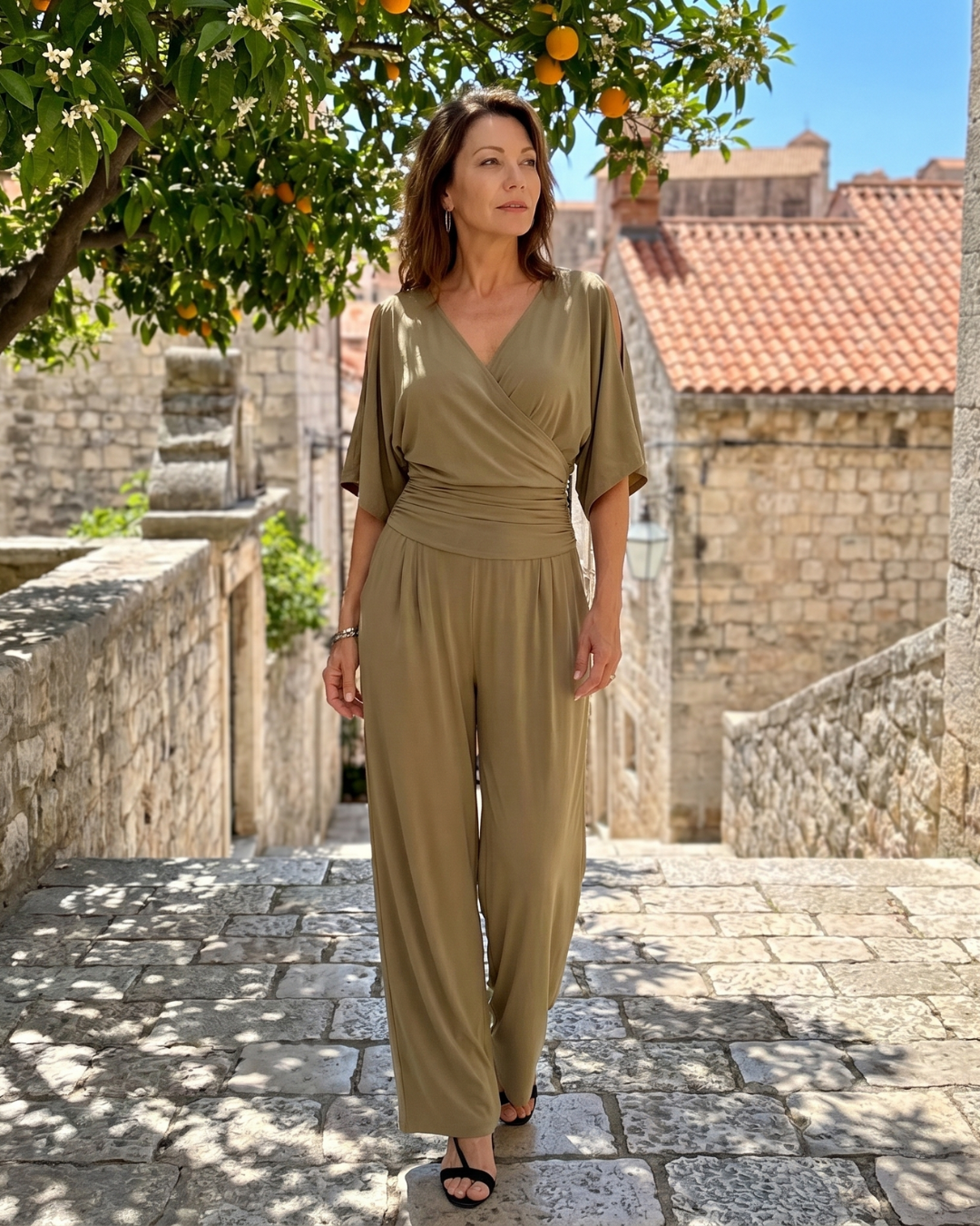 Nyxara | Cold-shoulder jumpsuit met wikkeltaille