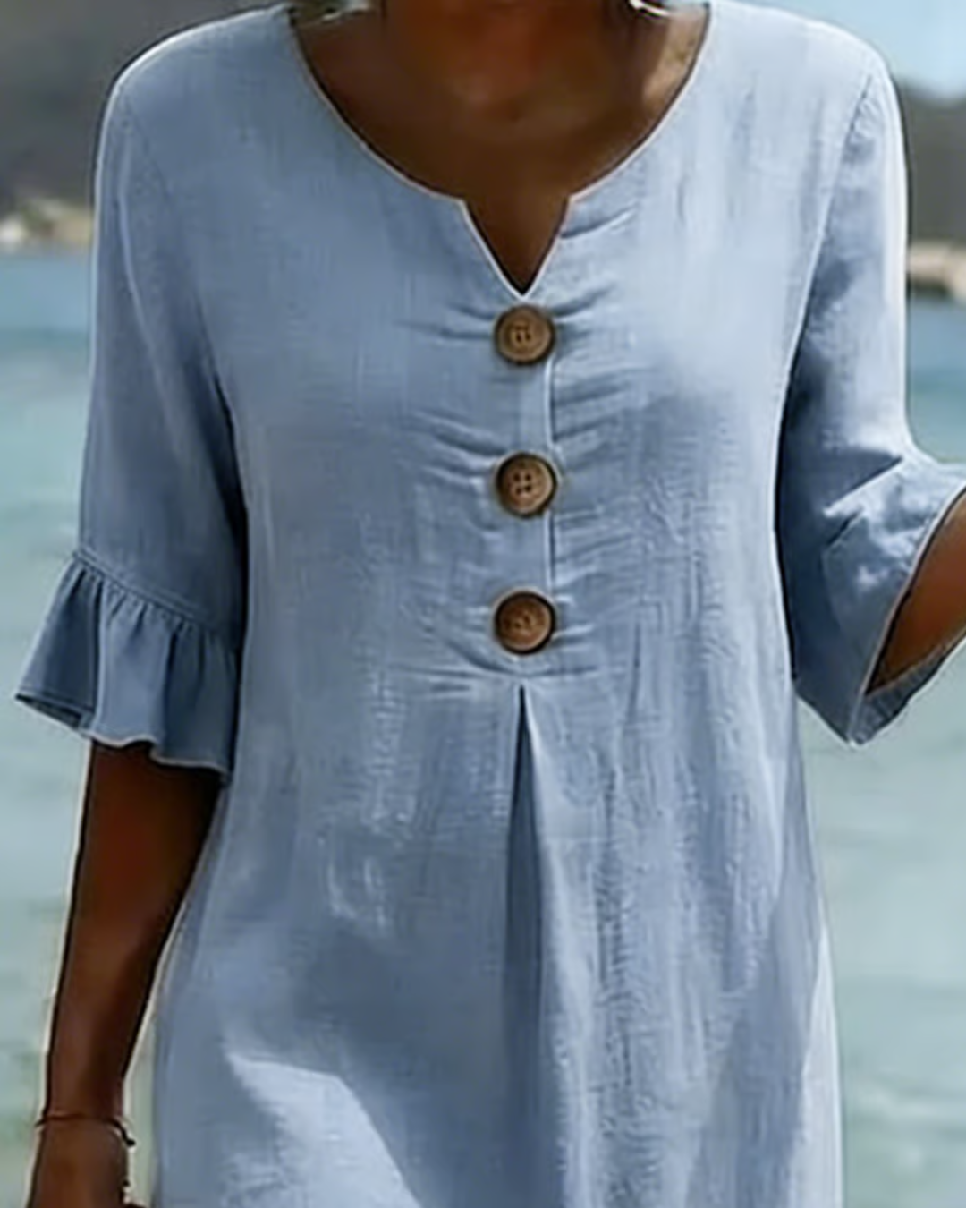 Midi-jurk met V-hals en knoopdetail