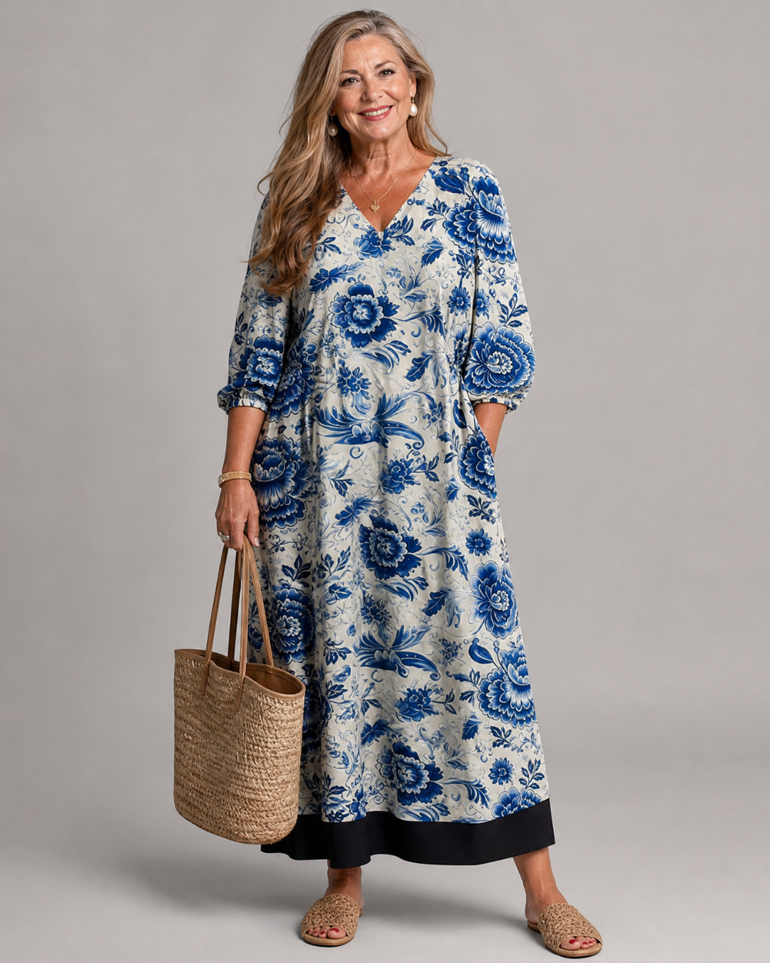 Celope | Midi-jurk met porseleinblauwe bloemenprint en zakdetail