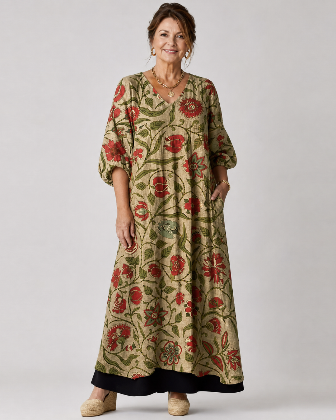 Rimla | Soepele midi-jurk met botanische print en driekwartmouw