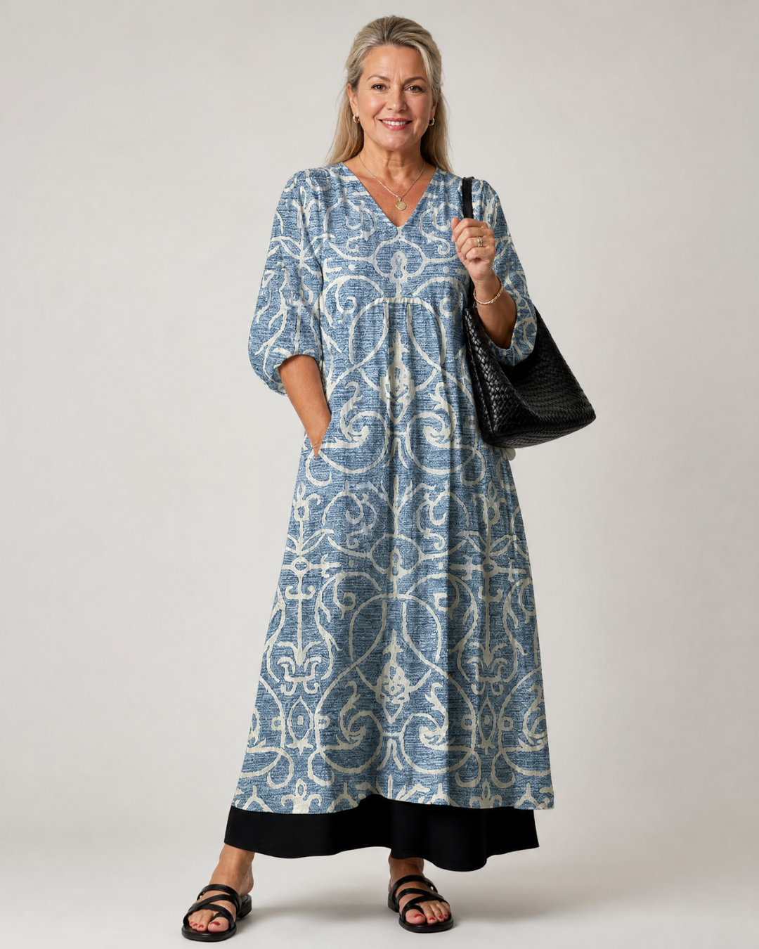 Lumera | Soepel vallende midi-jurk met vintage print