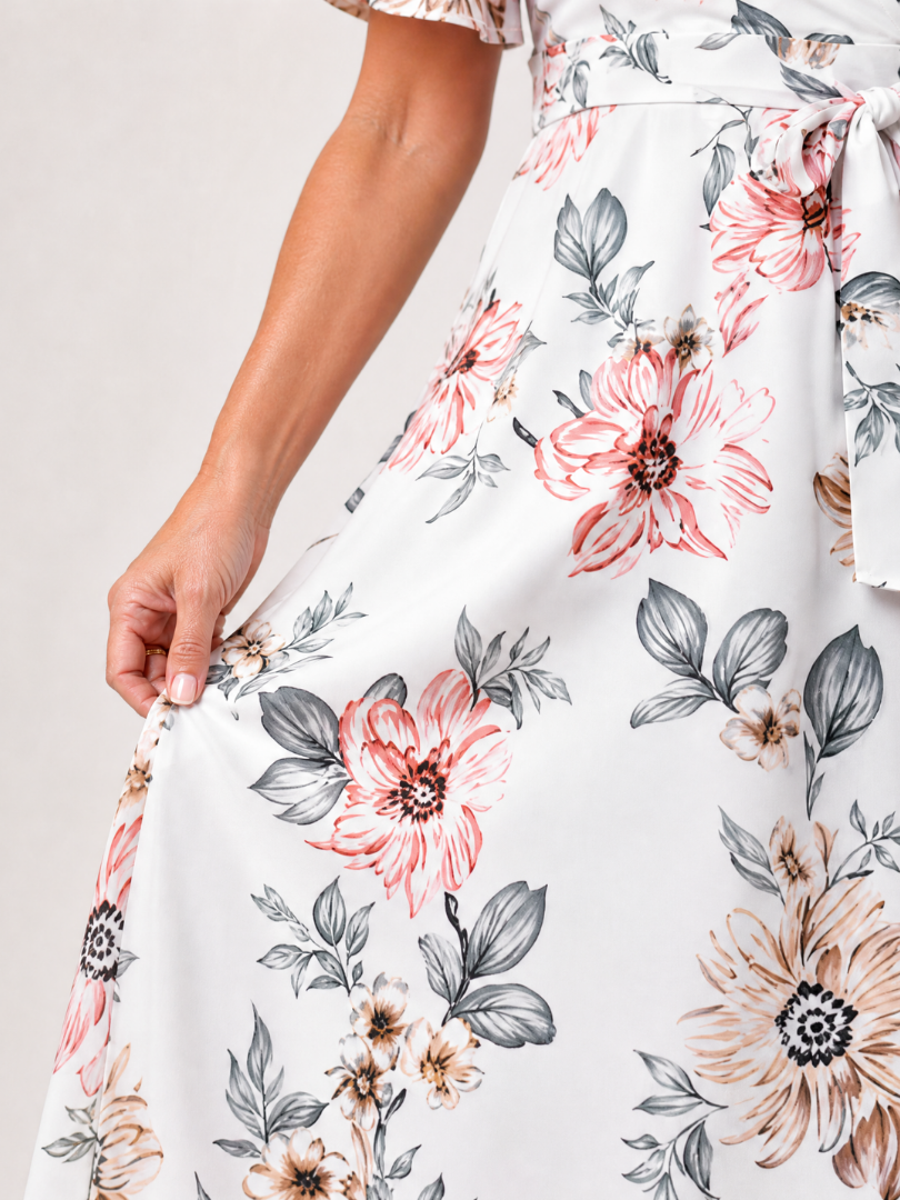 Meer | Midi-jurk met bloemenprint en strik