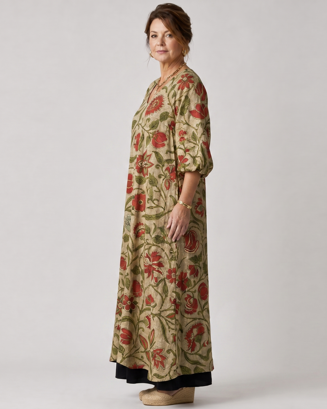 Rimla | Soepele midi-jurk met botanische print en driekwartmouw