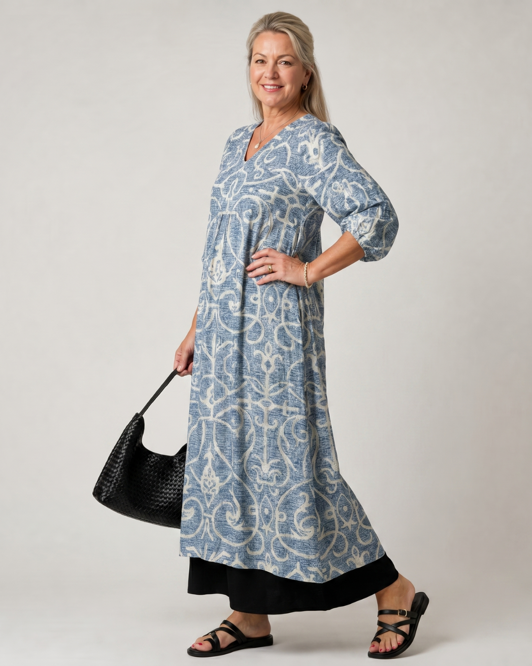 Lumera | Soepel vallende midi-jurk met vintage print