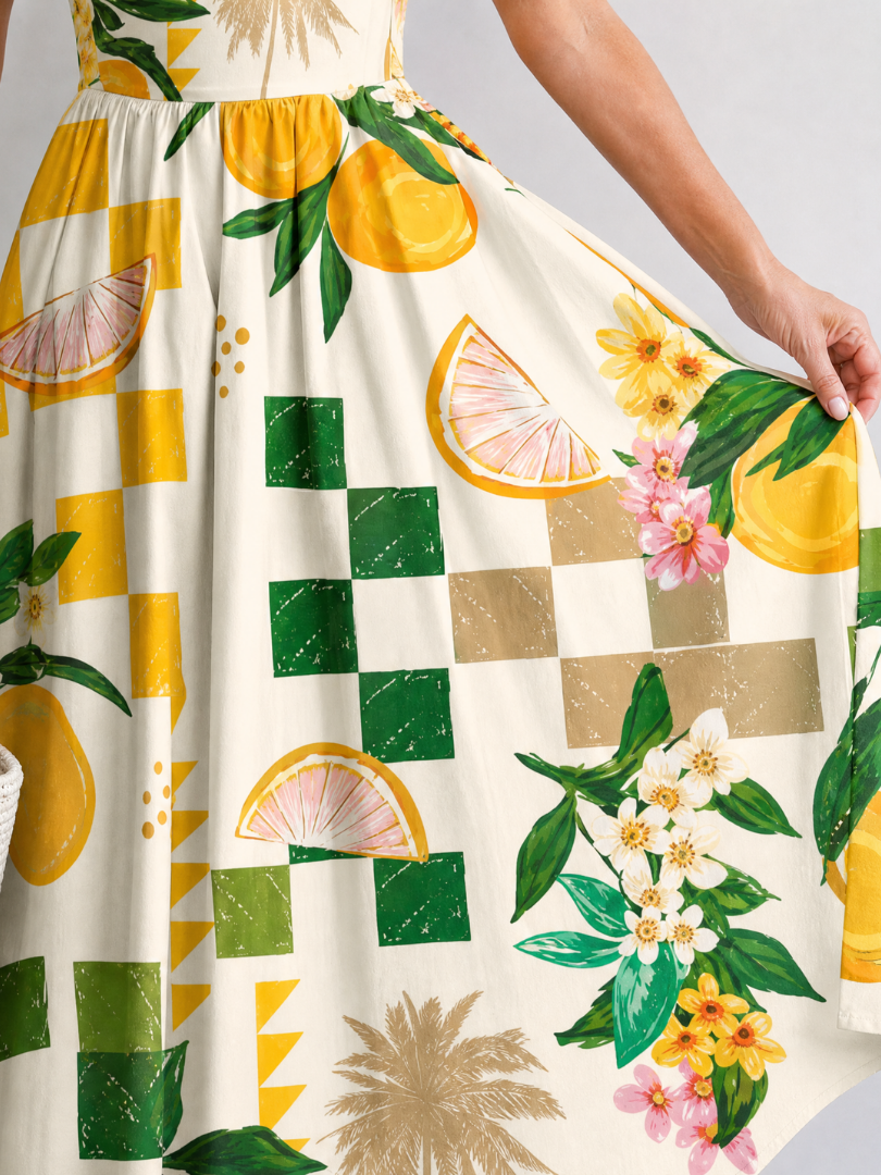 Aurexia | Mouwloze midi-jurk met citrusprint