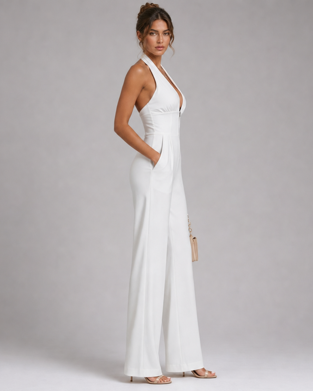 Nymera | Mouwloze halter jumpsuit met wijde pijpen