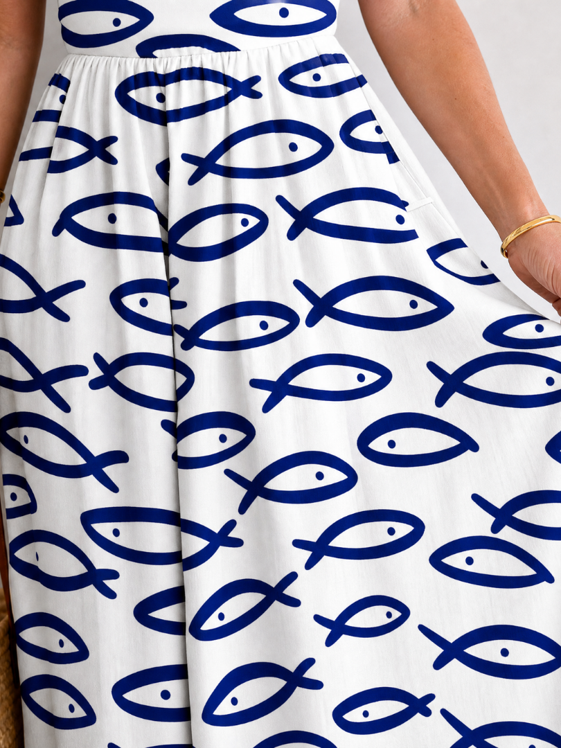 Thaloria | Mouwloze midi-jurk met visprint