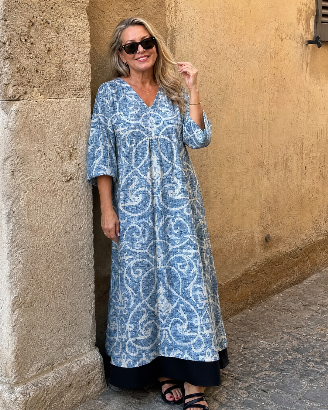 Lumera | Soepel vallende midi-jurk met vintage print