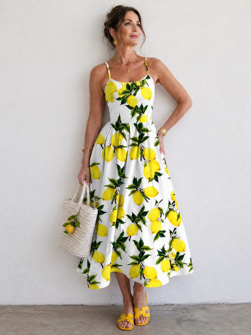Limonelle | Mouwloze midi-jurk met citroenprint