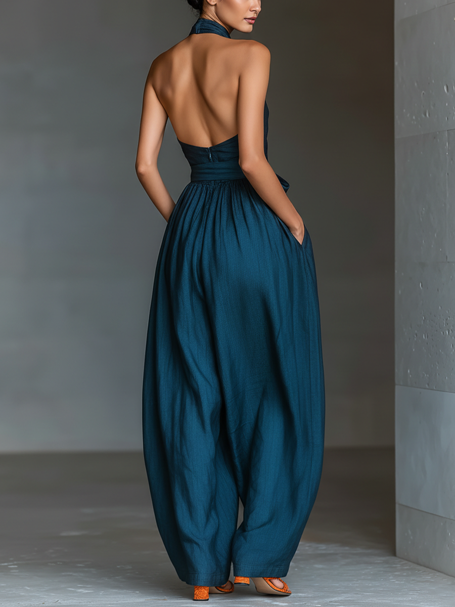 Solène | Jumpsuit met gekruiste schouderbanden en strikceintuur
