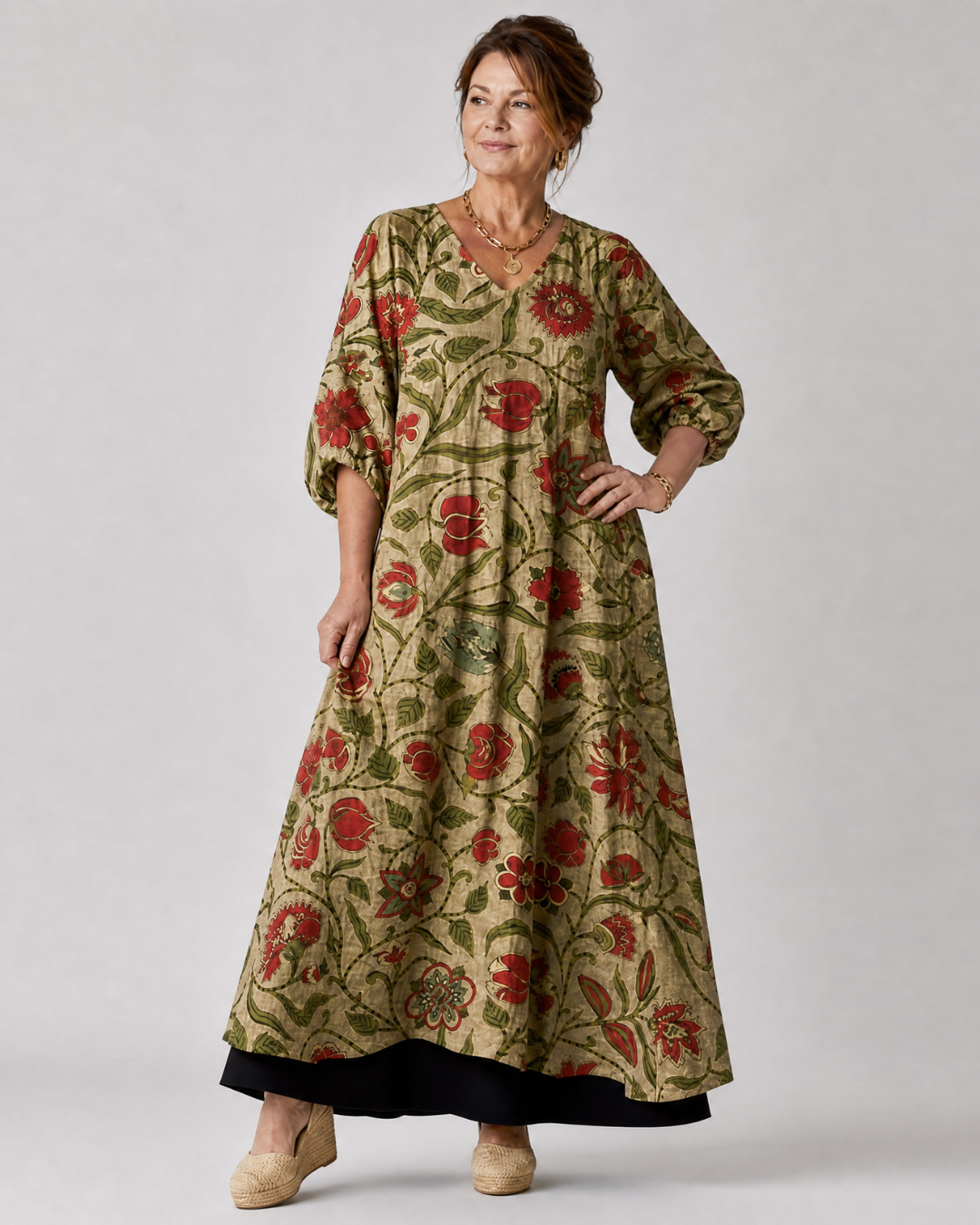 Rimla | Soepele midi-jurk met botanische print en driekwartmouw