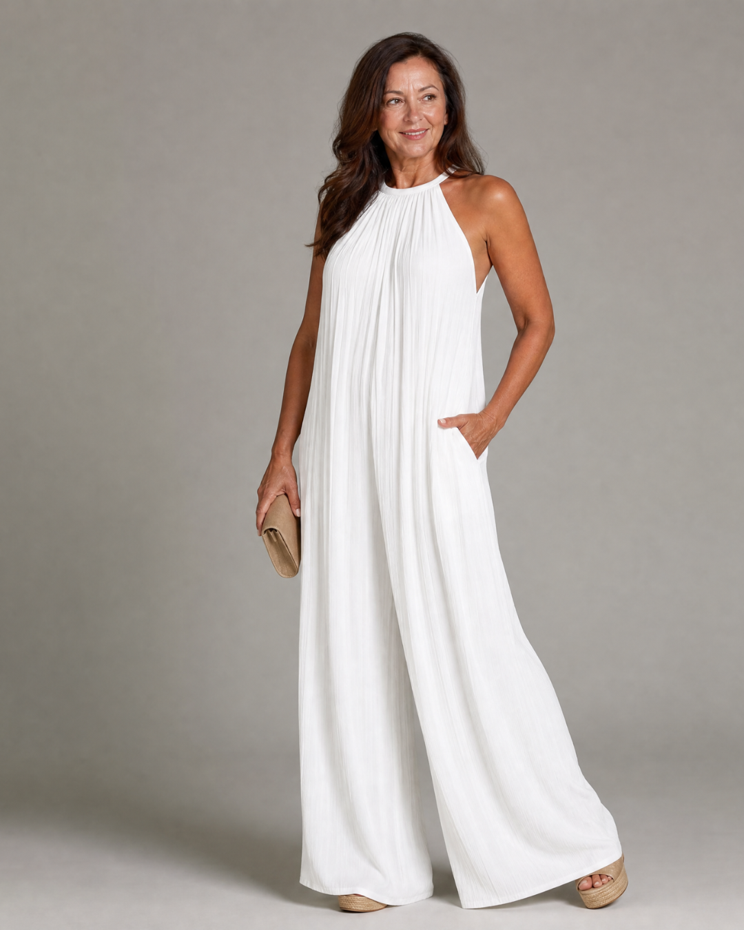 Sylvara | Geplooide halter jumpsuit met wijde pijpen