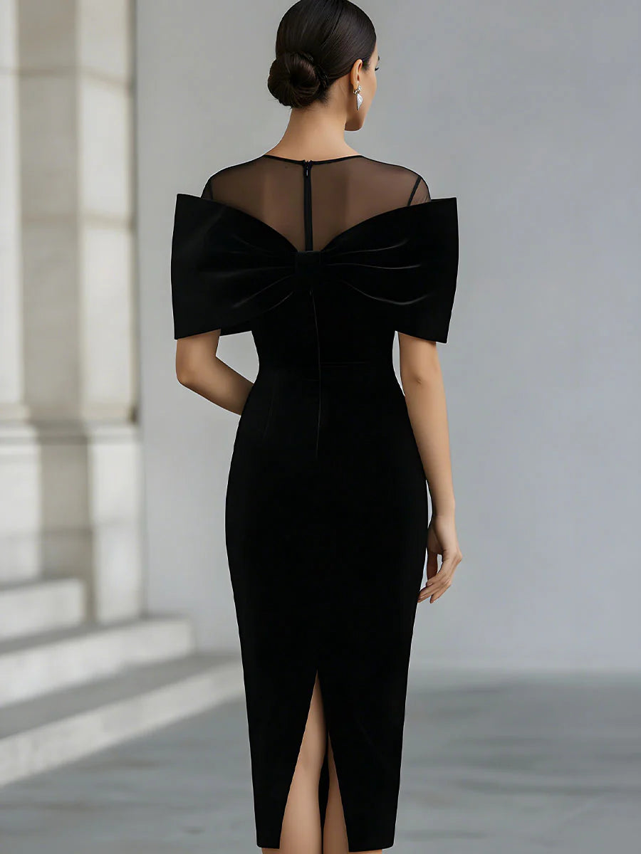 Regina ❘ Dramatische zwarte fluwelen midi-jurk met strik