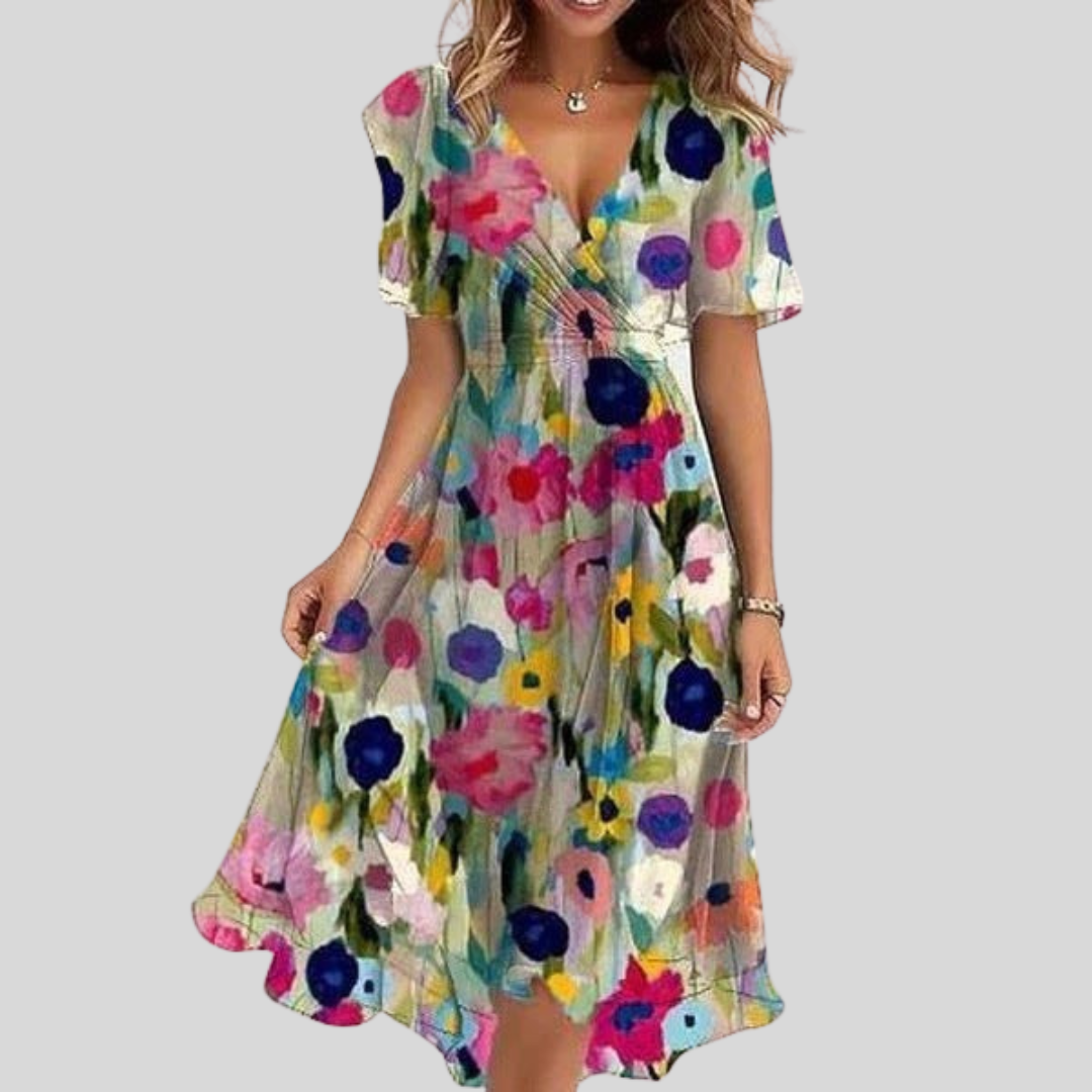 Naomie | Zomerjurk met V-hals en asymmetrische zoom