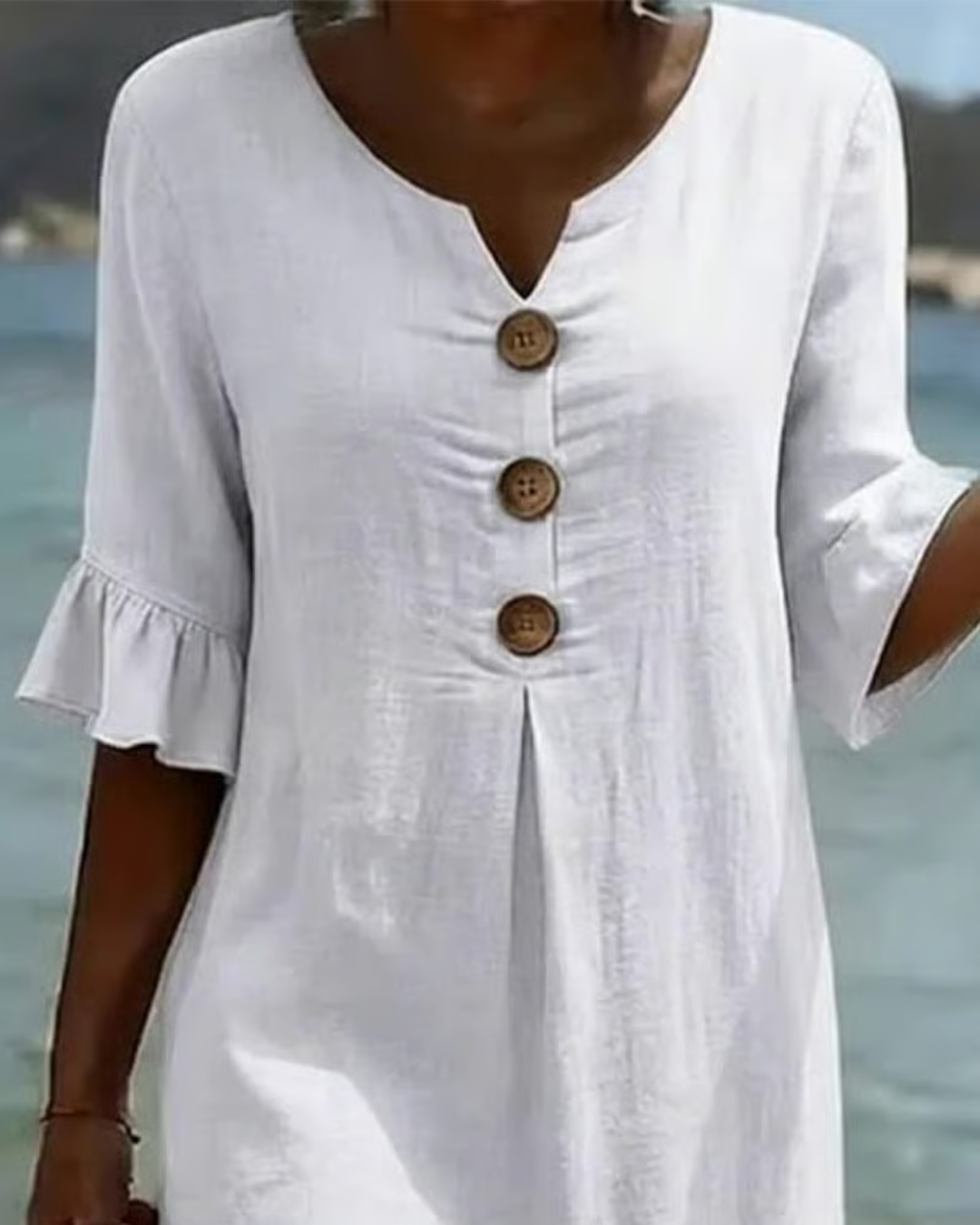 Midi-jurk met V-hals en knoopdetail