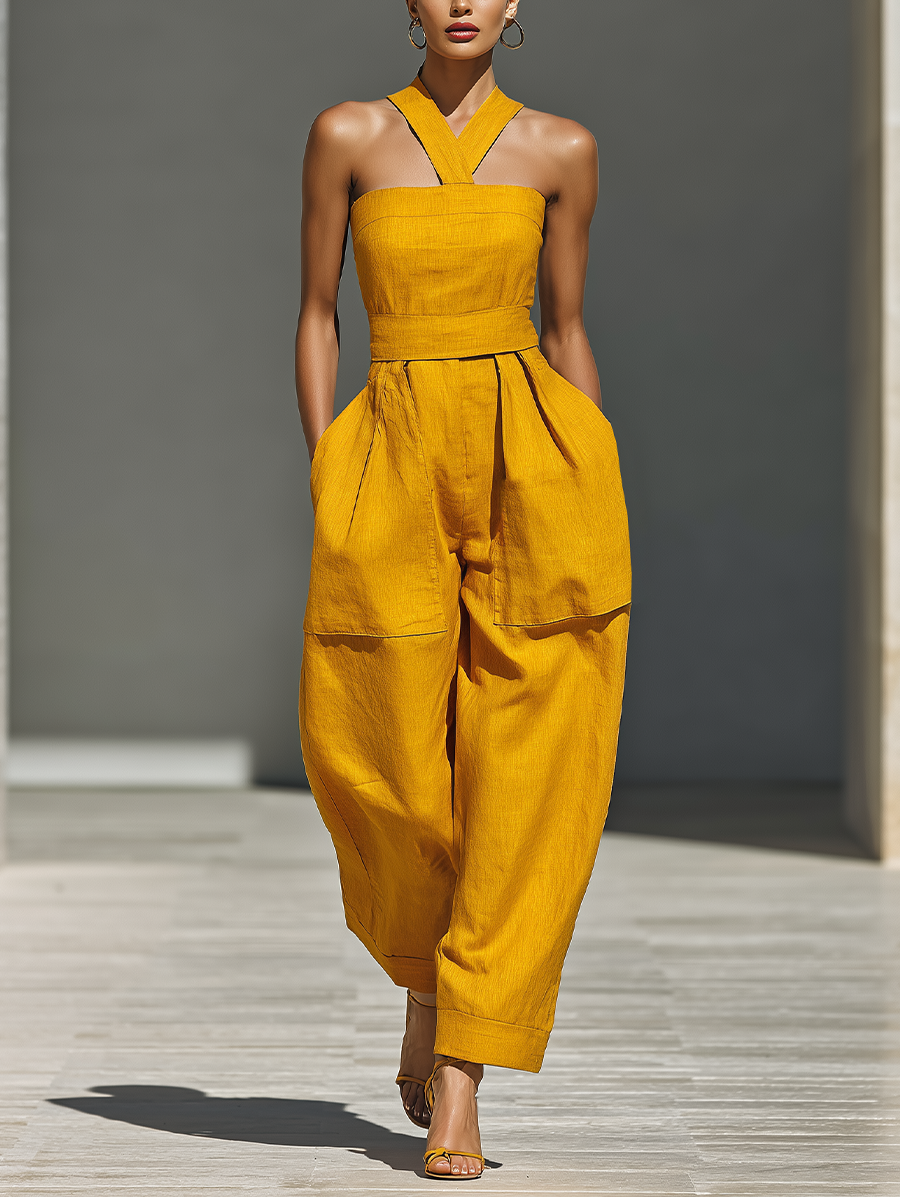 Gabrielle | Mouwloze jumpsuit met gekruiste halslijn en wijde pijpen