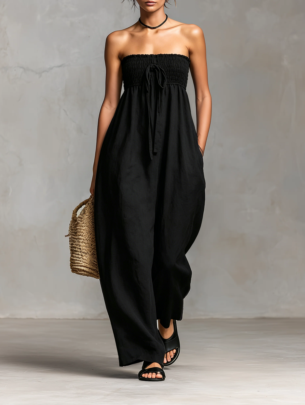 Fleur | Mouwloze jumpsuit met strikceintuur
